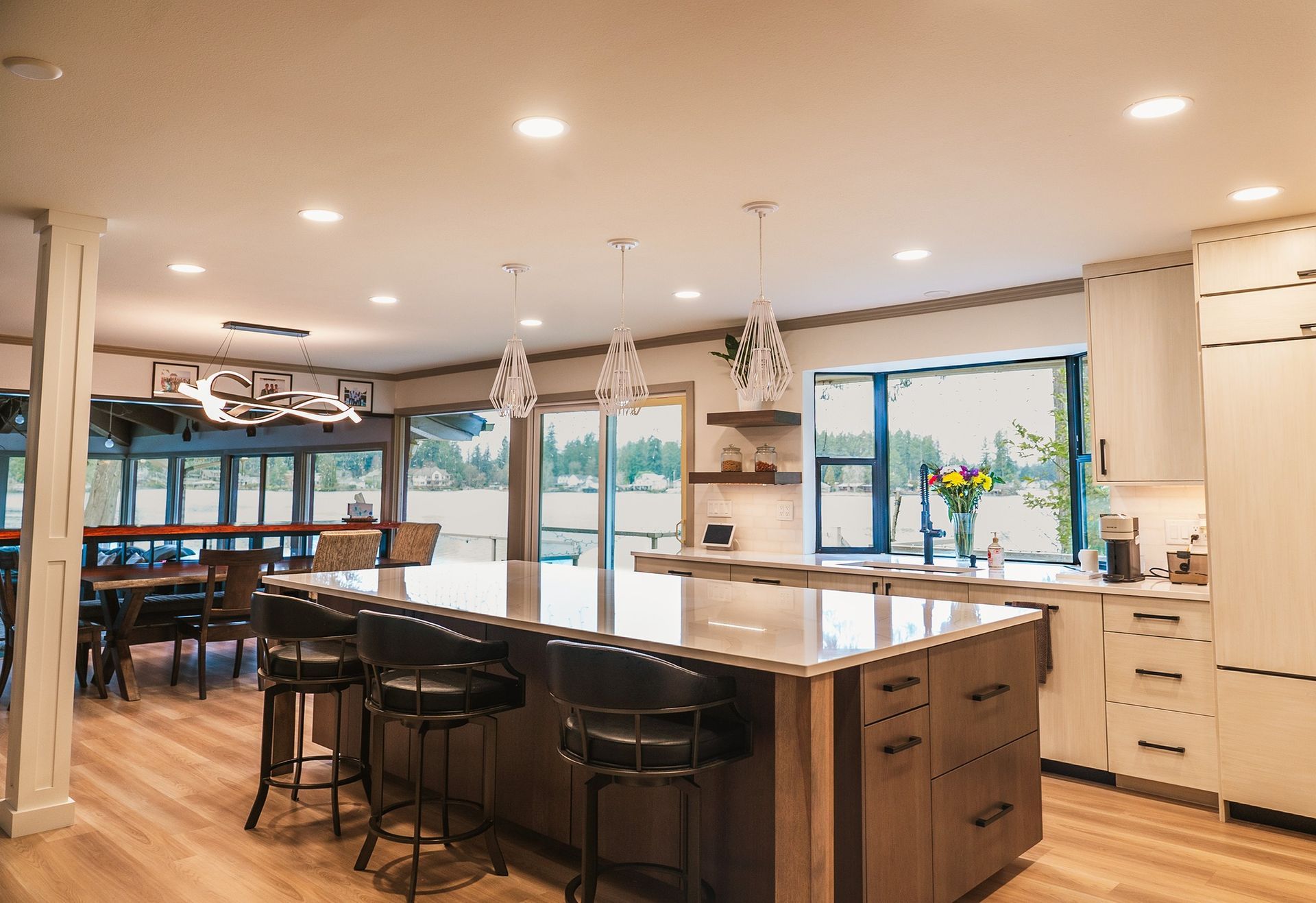 There is a large island in the middle of the kitchen.