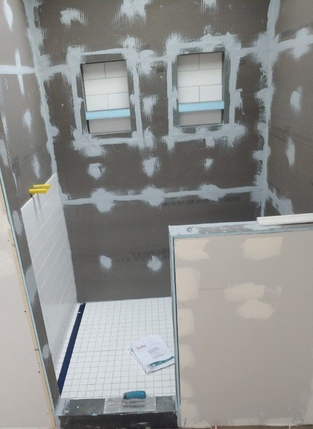 Before and after look of tile bathroom