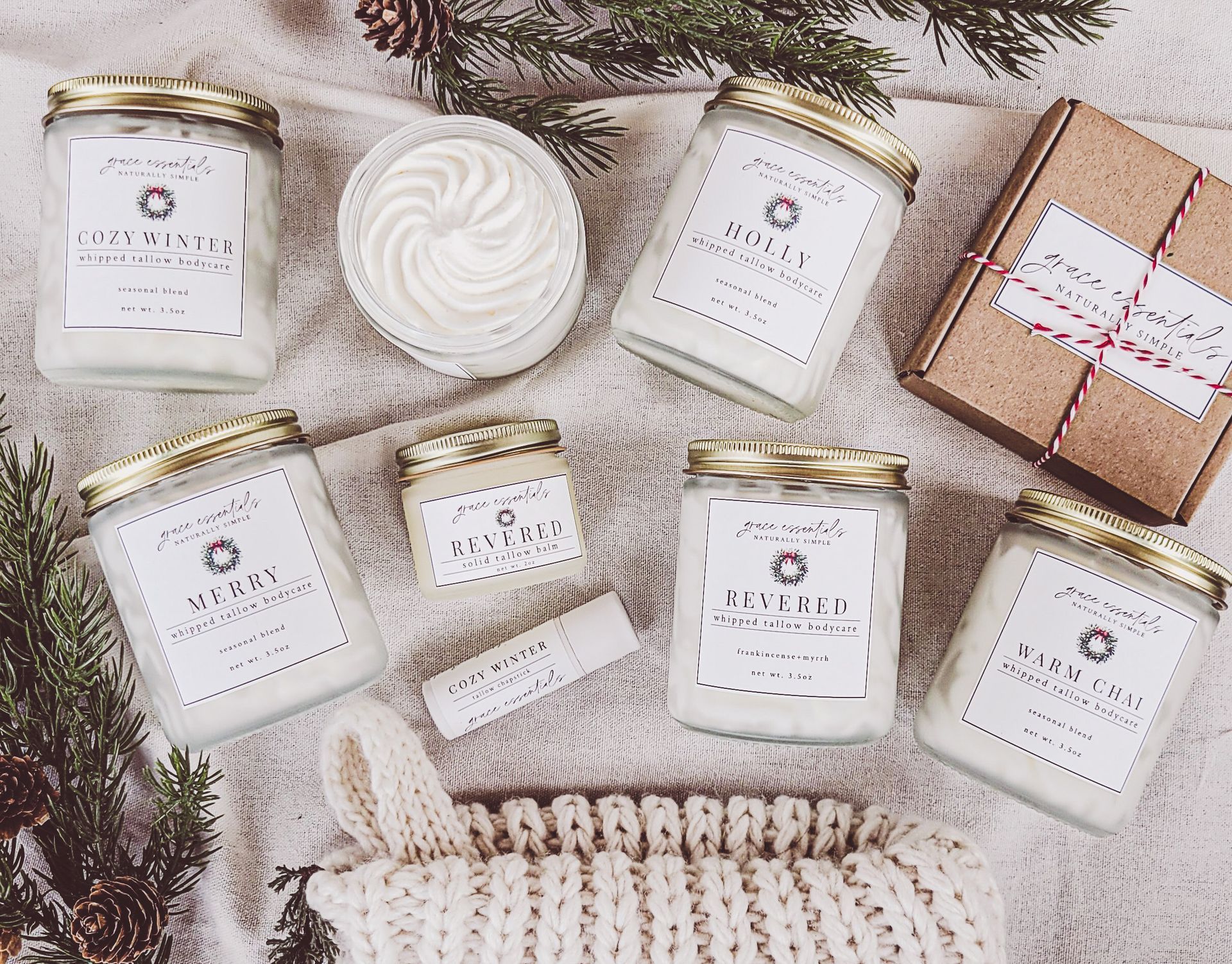 Close up of tan Journal on top of bible sitting on Amy's lap that says  strong beautiful brave courageous.  Contrasted and creamy photo. Amy wearing white long sleeve shirt and blue and white flowy skirt. White painted nails.