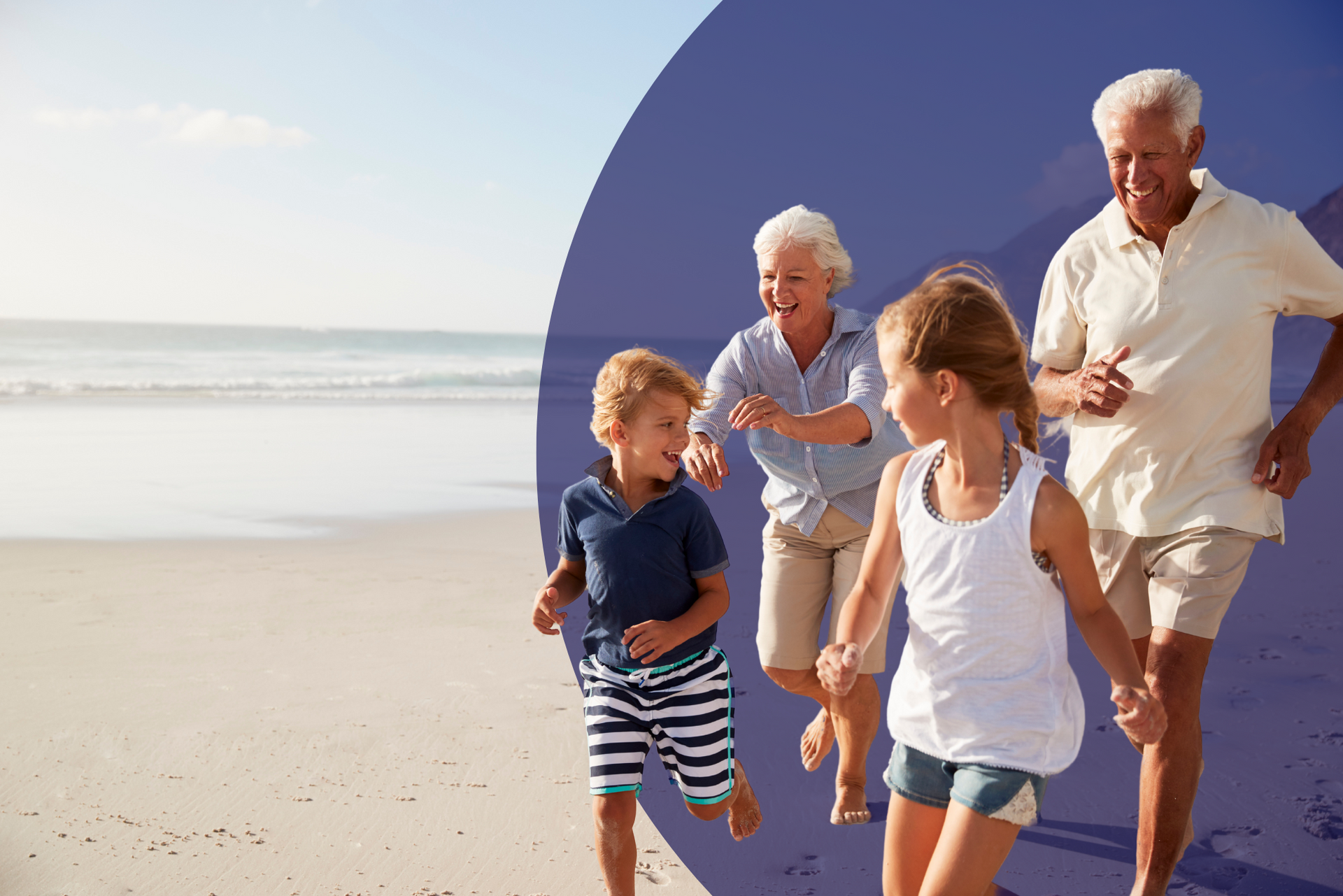 An elderly couple and two children are running on the beach.