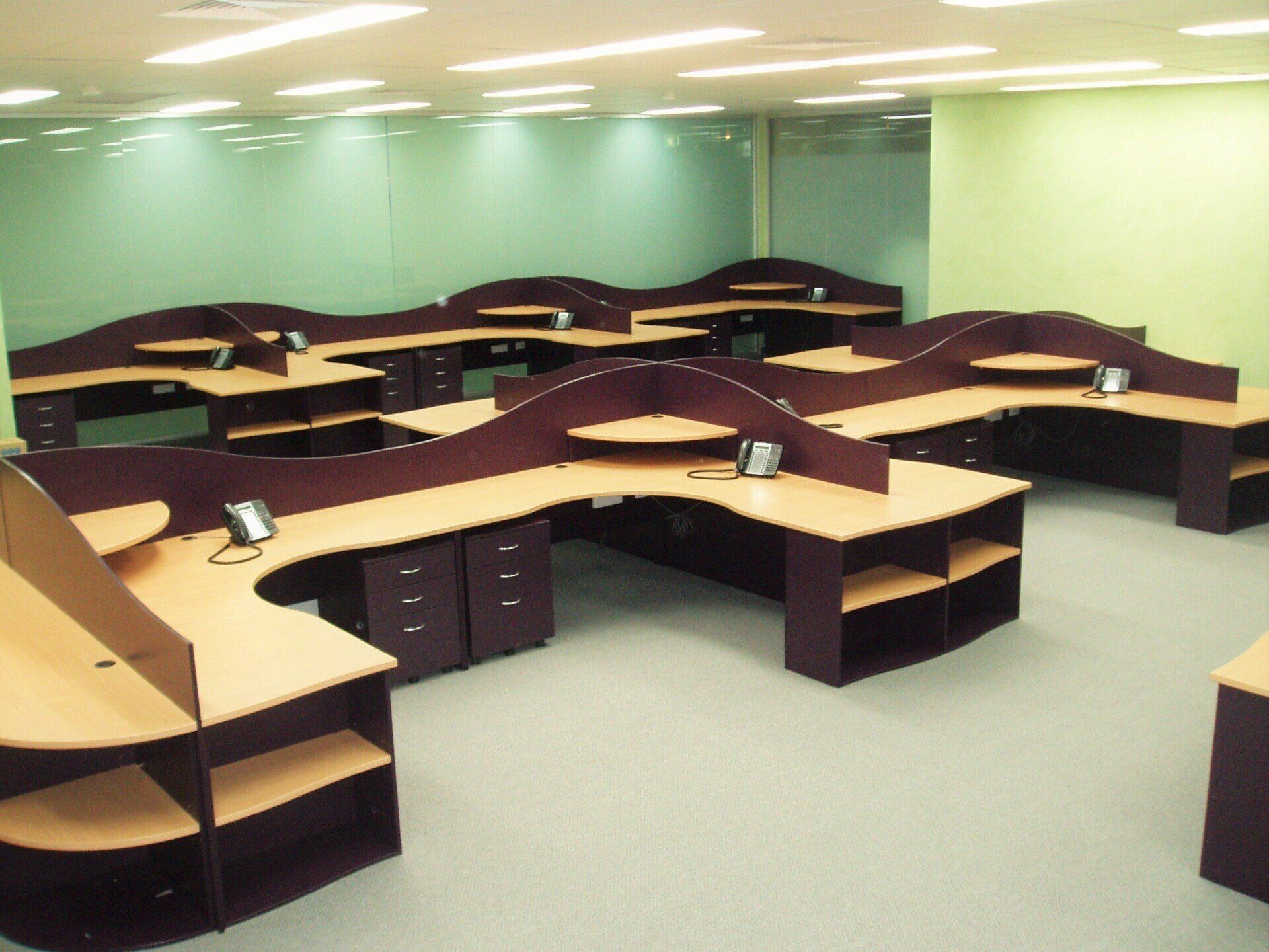 A Large Office with A Lot of Cubicles and Telephones — Marlix Custom Timber Furniture Design and Joinery in Unanderra, NSW