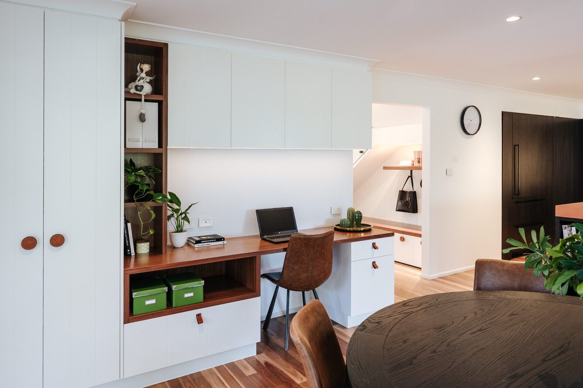 There Is a Desk with A Laptop on It in The Living Room — Marlix Custom Timber Furniture Design and Joinery in Unanderra, NSW
