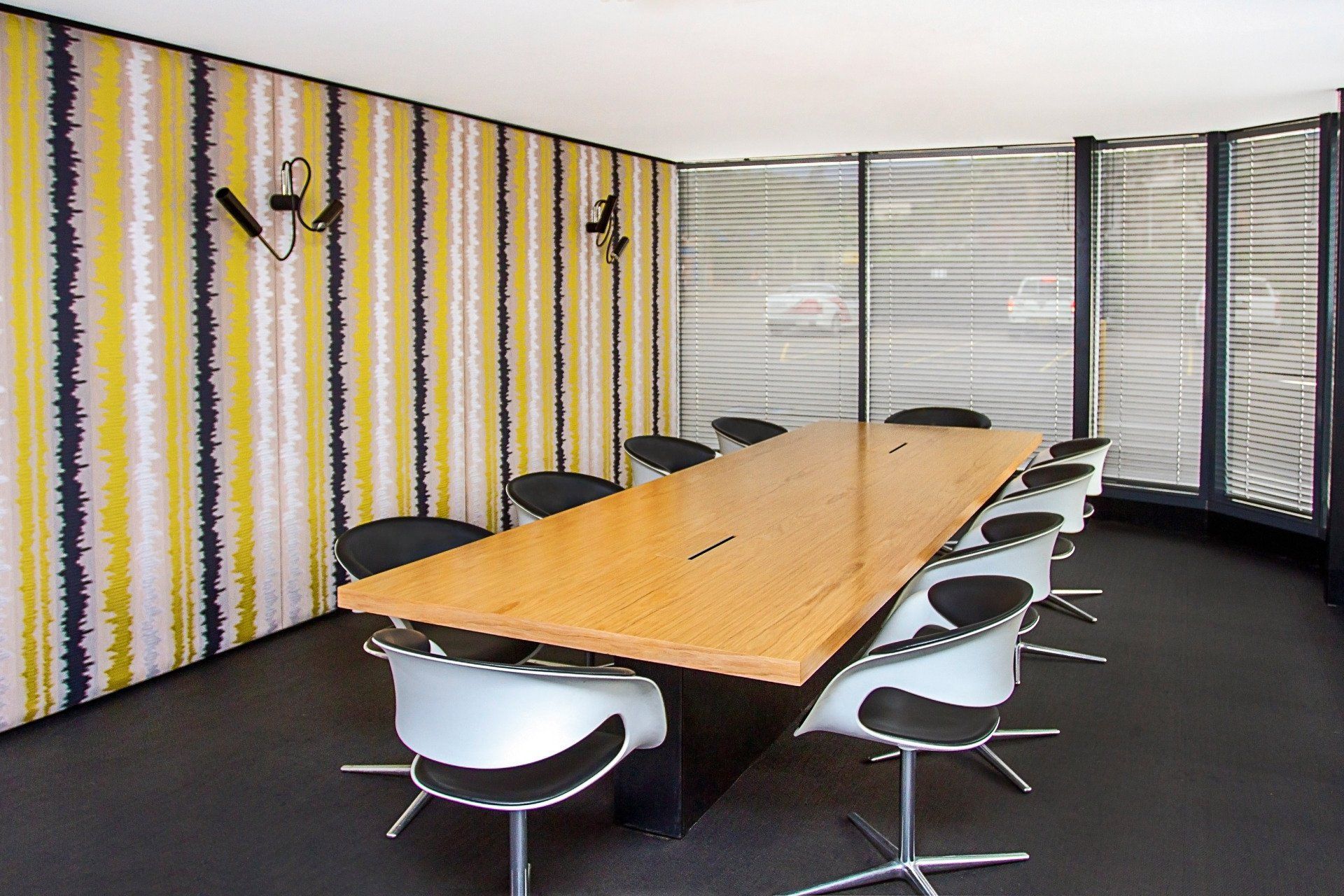 A Conference Room With A Long Table And Chairs — Marlix Custom Timber Furniture Design and Joinery in Unanderra, NSW