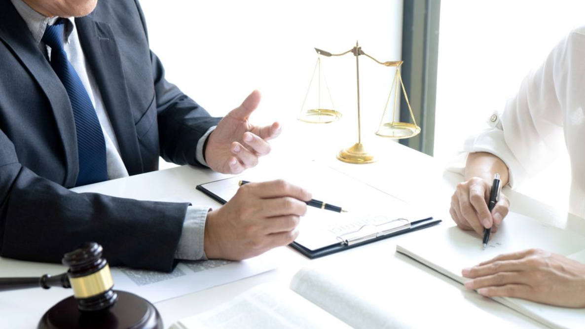 lawyer talking to client