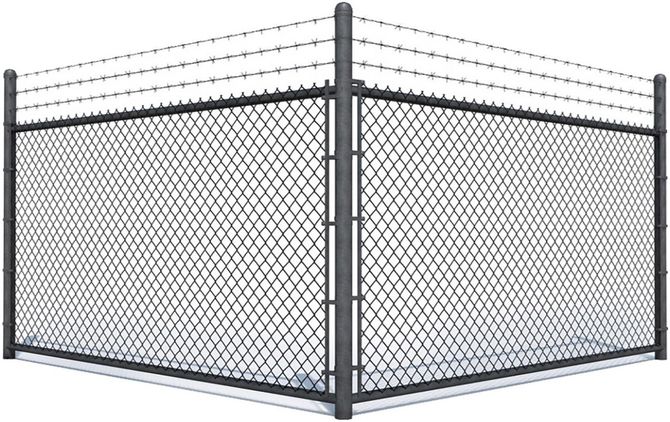A corner section of a tall gray chain-link fence topped with barbed wire against a white background.