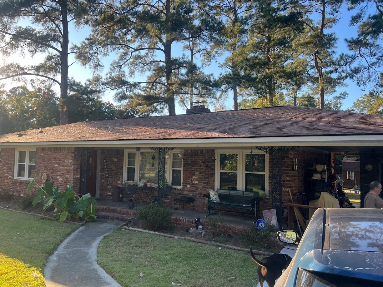 Professional contractors installing fascia and soffit.