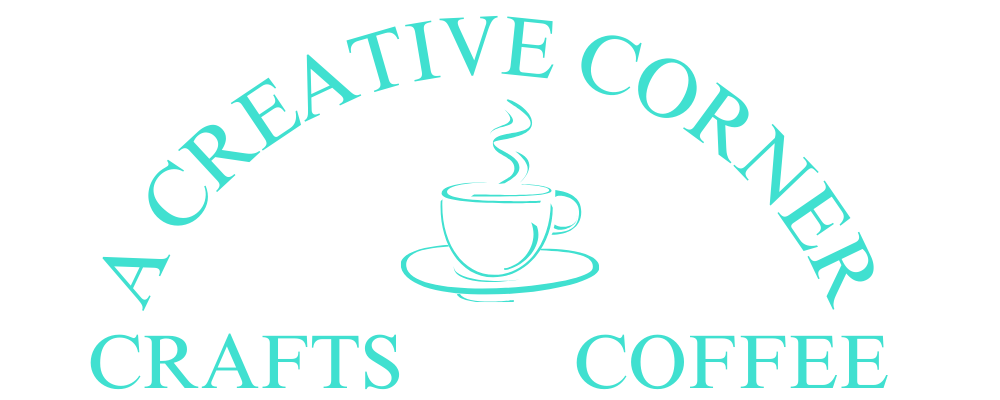 A creative corner crafts coffee logo with a cup of coffee on a saucer.