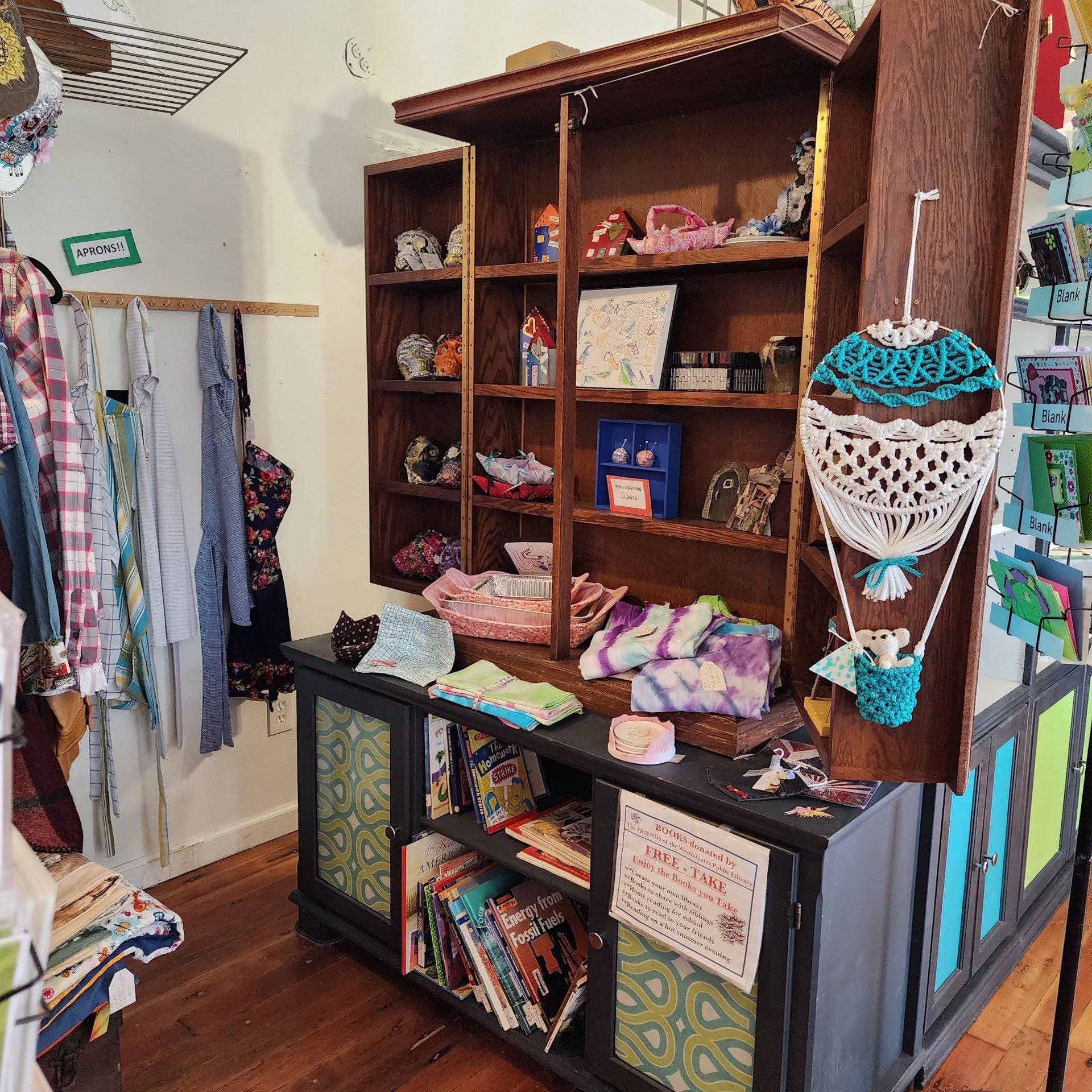 A shelf with a hot air balloon hanging from it