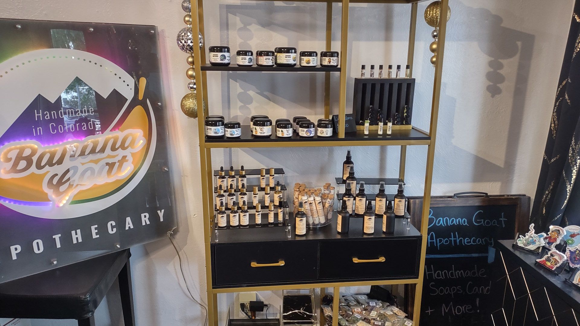 A shelf filled with bottles and jars in a store.