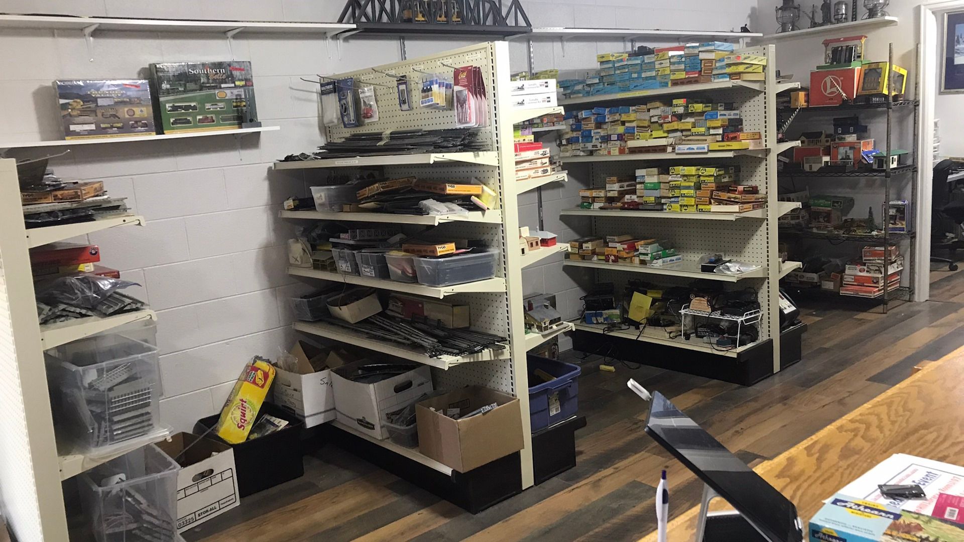 A store filled with lots of shelves filled with toys.