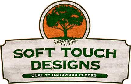 A sign that says soft touch designs quality hardwood floors