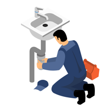 Fontanero con mono azul arrodillado, arreglando las tuberías de un fregadero, con una caja de herramientas y un tapón.