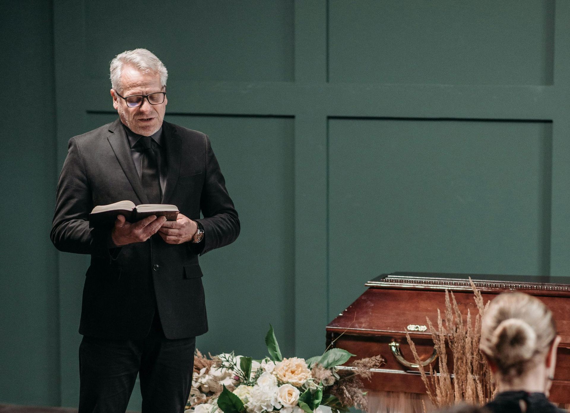 Man giving a eulogy at a funeral