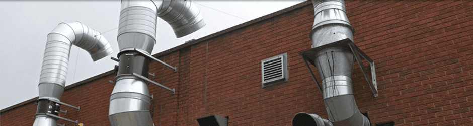 ventilation ducts on the side of a building