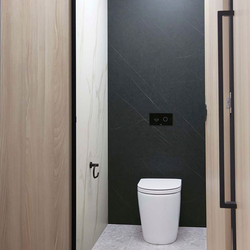 A Public toilet with wooden door and black wall — The Right Toilet Co In Unanderra, NSW