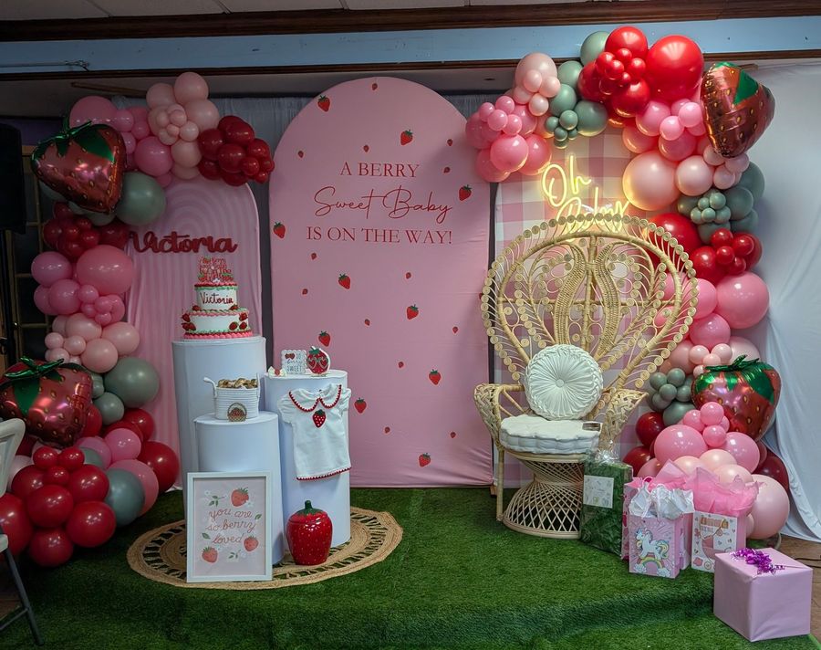 Balloon arch and display in pinks, browns, gold for a 90th birthday celebration.