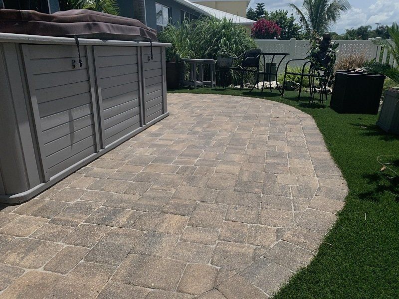 Paver sealing pool in Boca Raton – before and after.