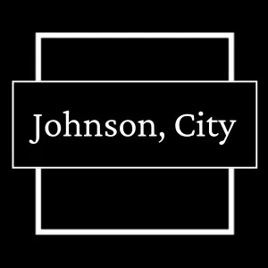 Johnson, City sign in white text on a black background with overlapping white-outlined rectangles