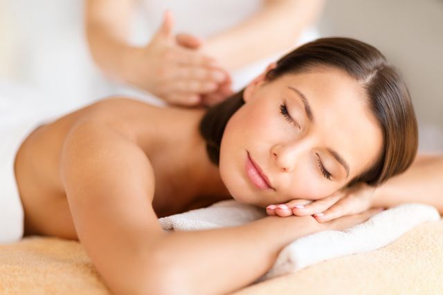 Shoulder and Neck Massage for Woman in Spa Salon. Stock Image