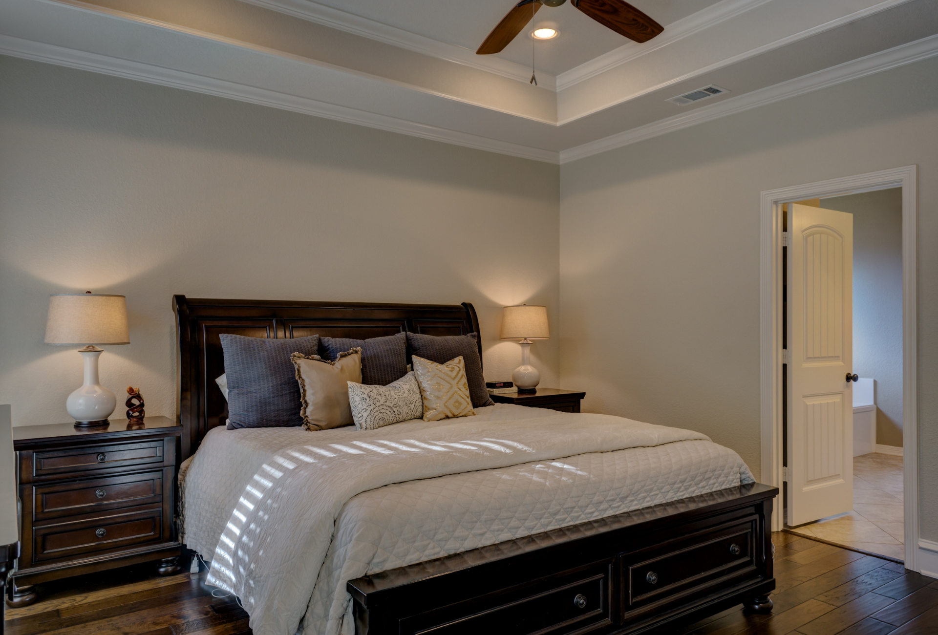A kitchen with granite counter tops and wooden cabinets