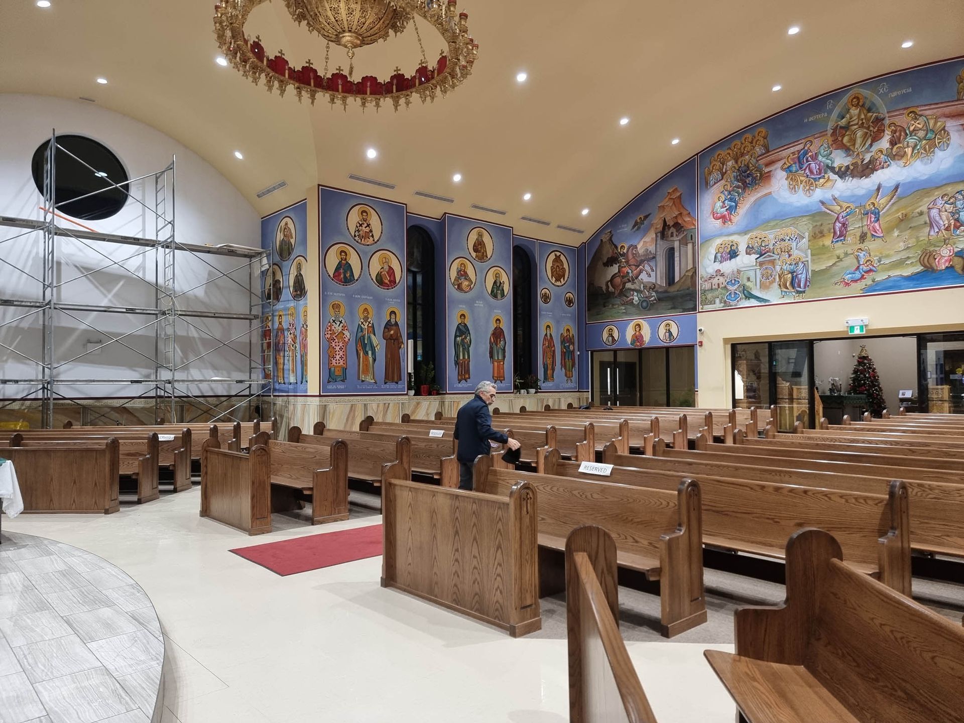 Iconography installation in Holy Cross Church Windsor, Ontario. New church construction interior decoration and adornment.