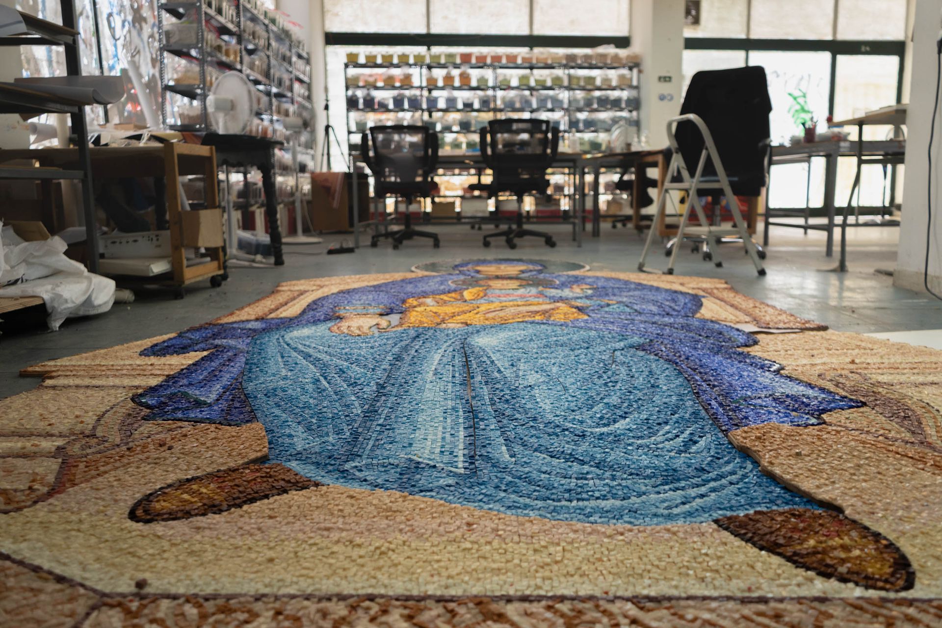 Large Mother of God & Christ Child mosaic laid out in Greek studio, showing massive scale & hand-cut Byzantine tesserae work