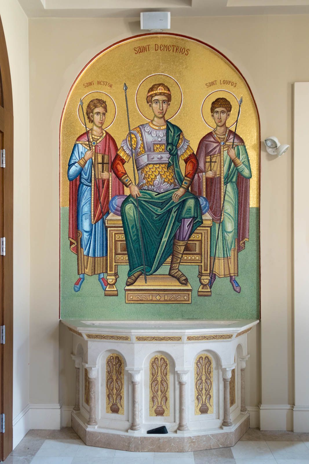 Ecclesiastical wall mosaic of St. Demetrios Enthroned with Ss. Nestor and Lupus, custom marble furnishing with floral motif