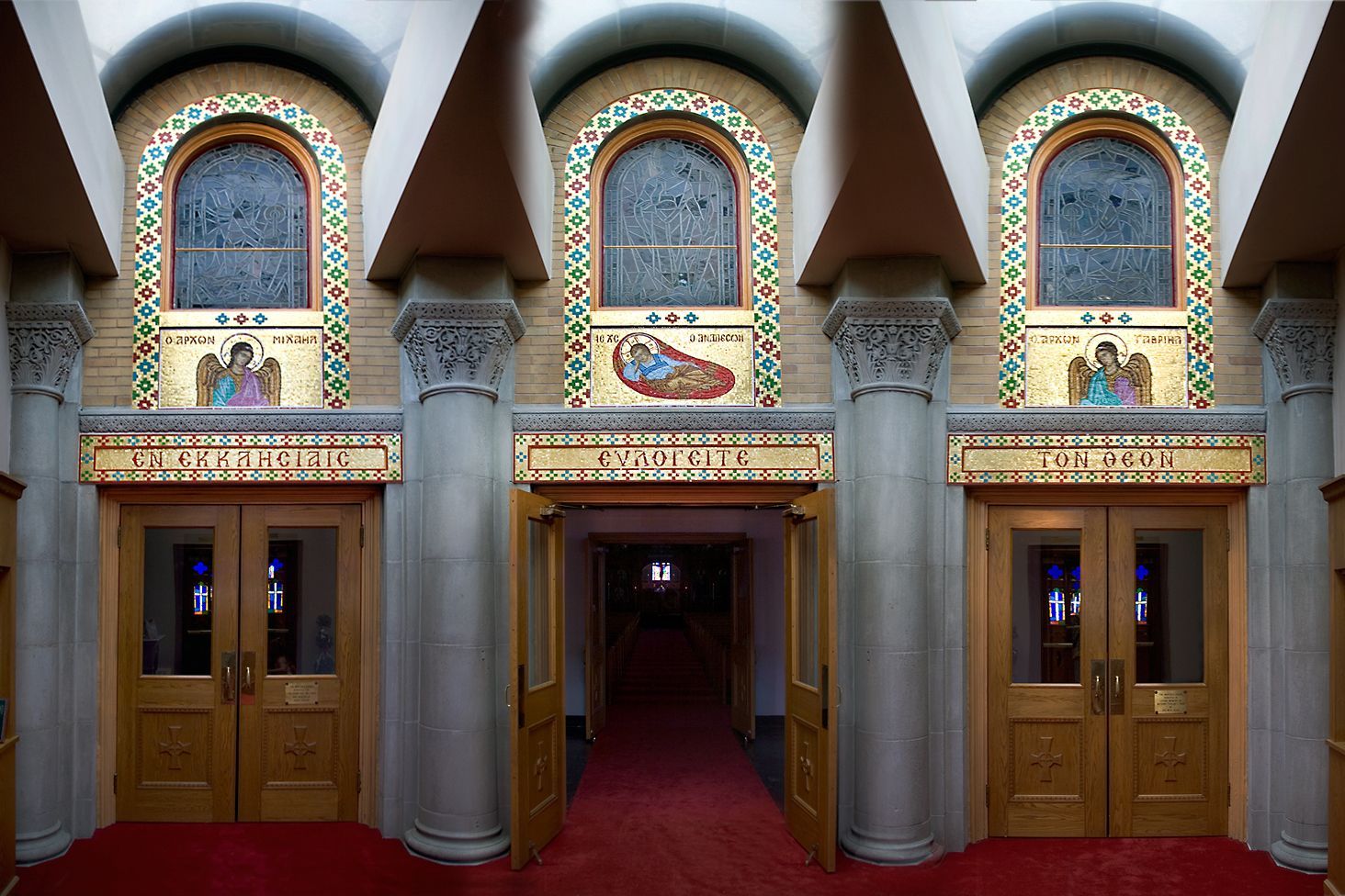 Triune entrance with Byzantine mosaic ornamentation and iconography at Taxiarchae Greek Orthodox Church, Watertown, MA.