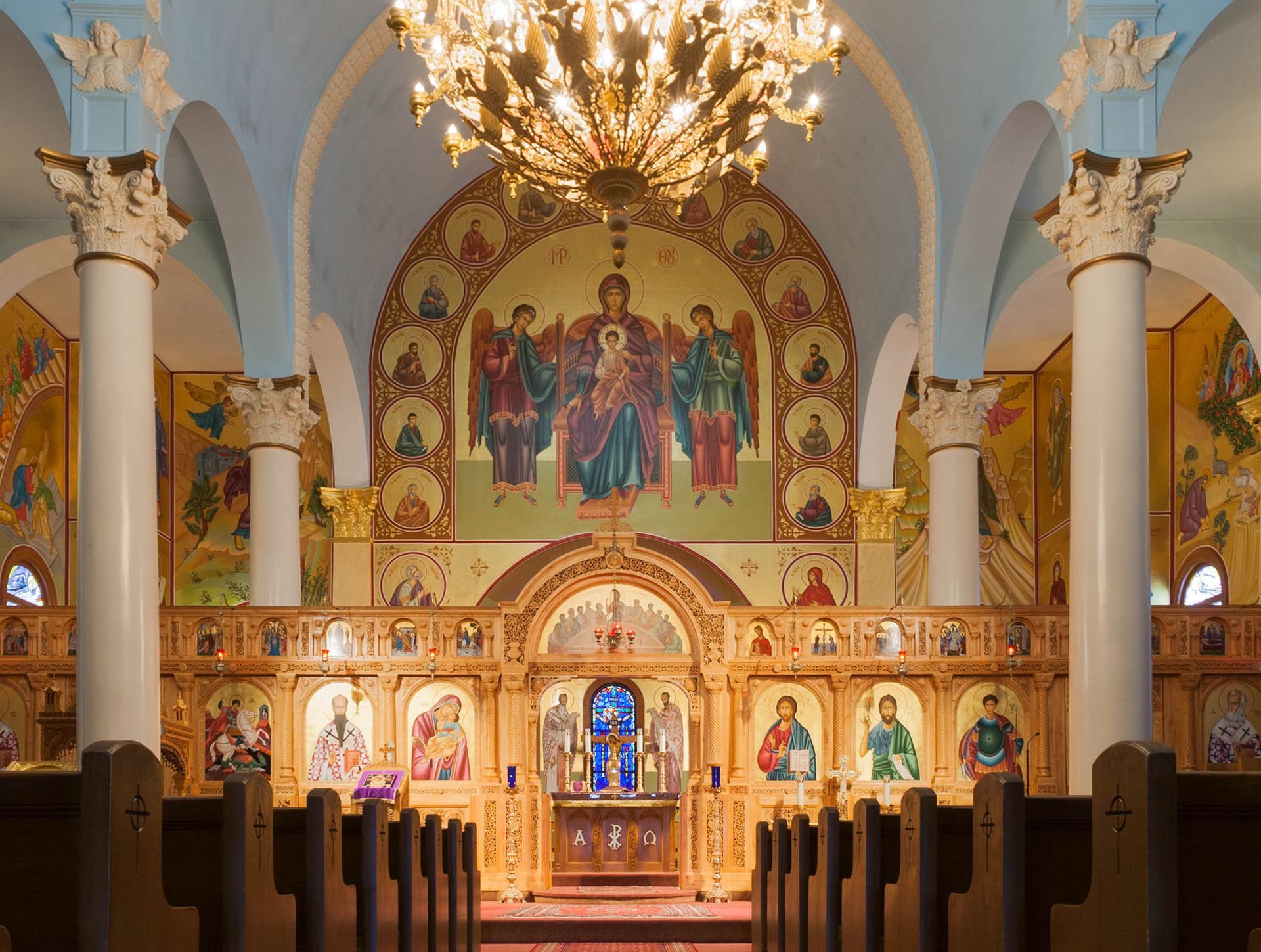 Byzantine church interior renovation with restored iconography and reworked sanctuary wall, Greek Orthodox liturgical art