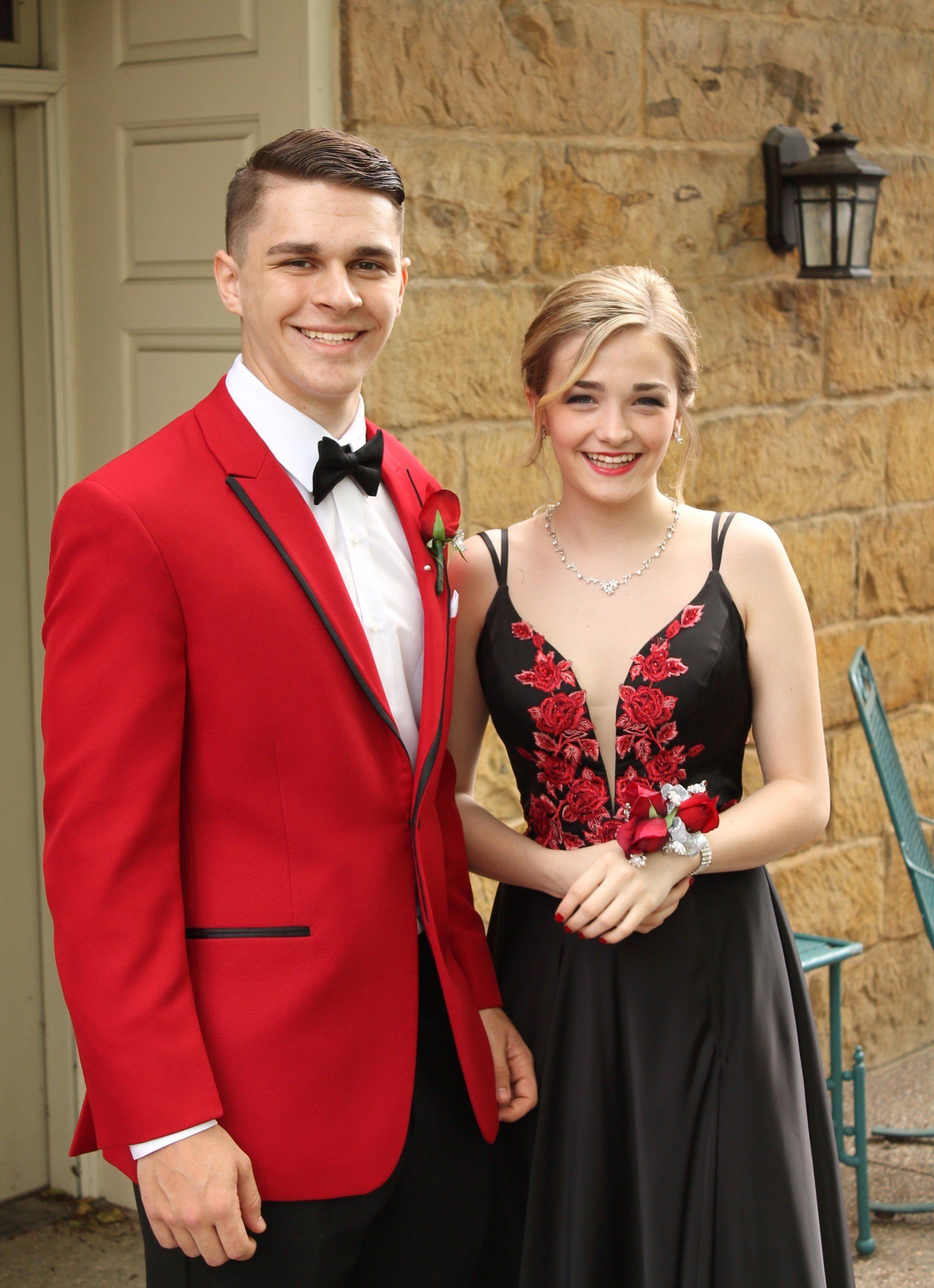 Man in Red Tuxedo and Girl in Black and Red Gown in Washington, PA