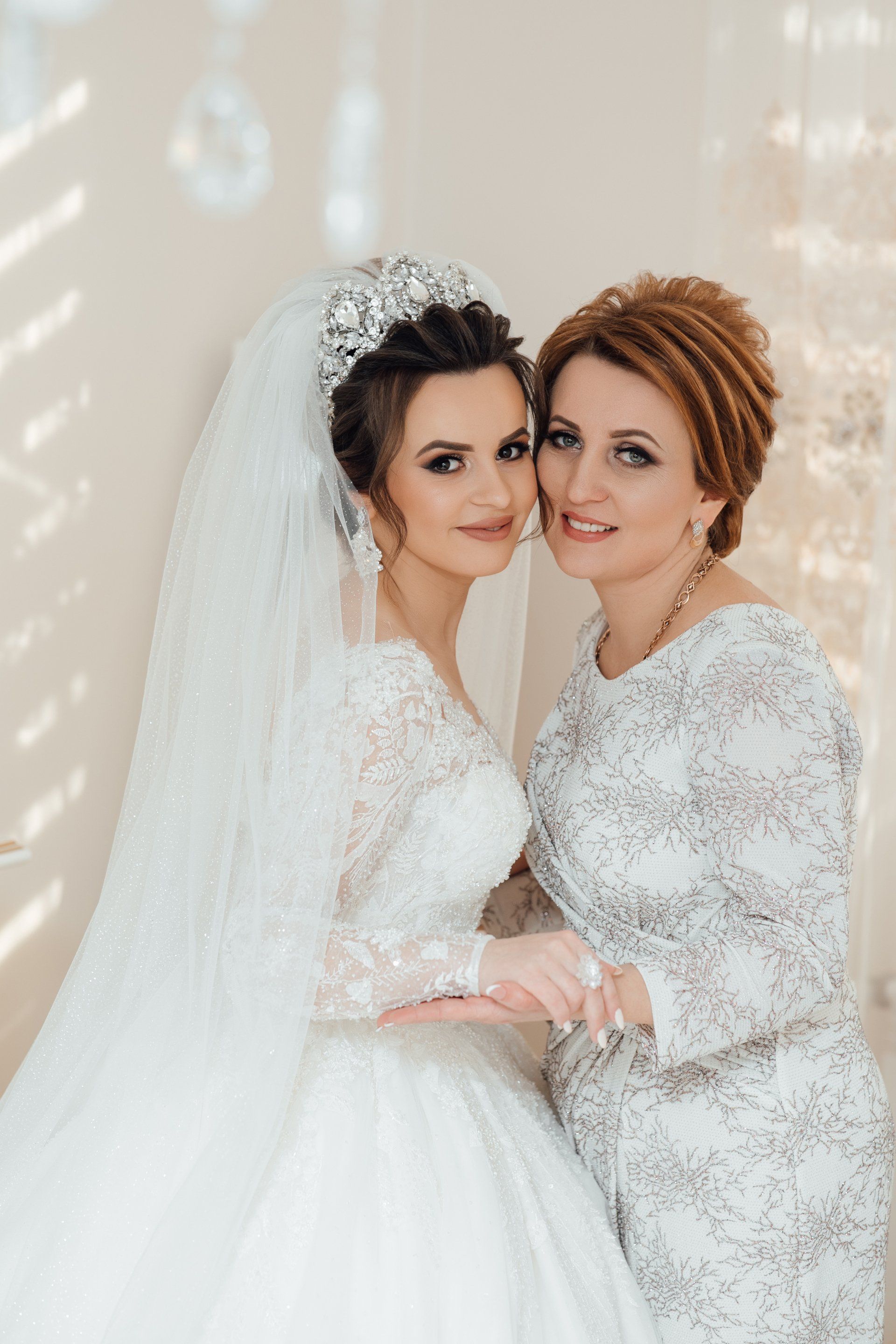 Daughter who became the bride gently embraces her mother in Washington, PA