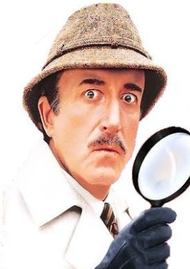 A man in a hat is holding a magnifying glass