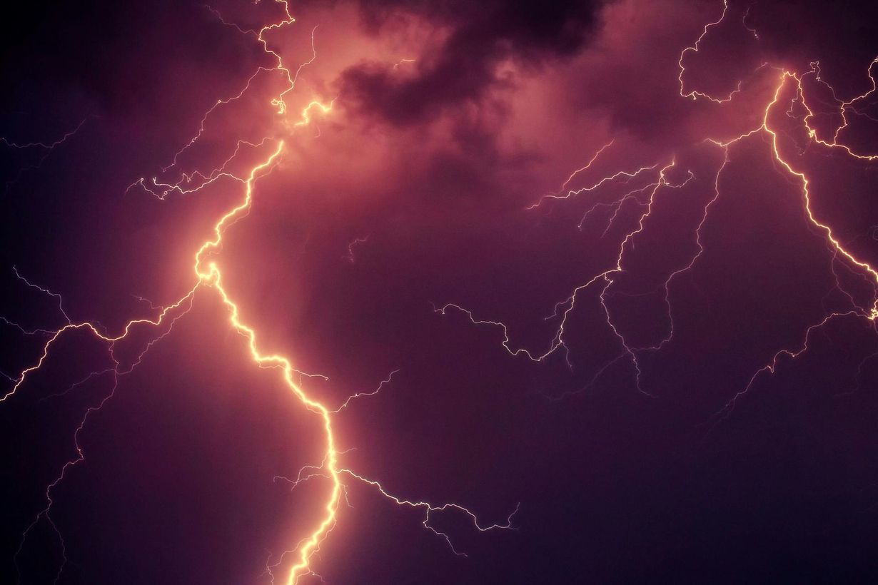 A close up of a lightning bolt in the sky