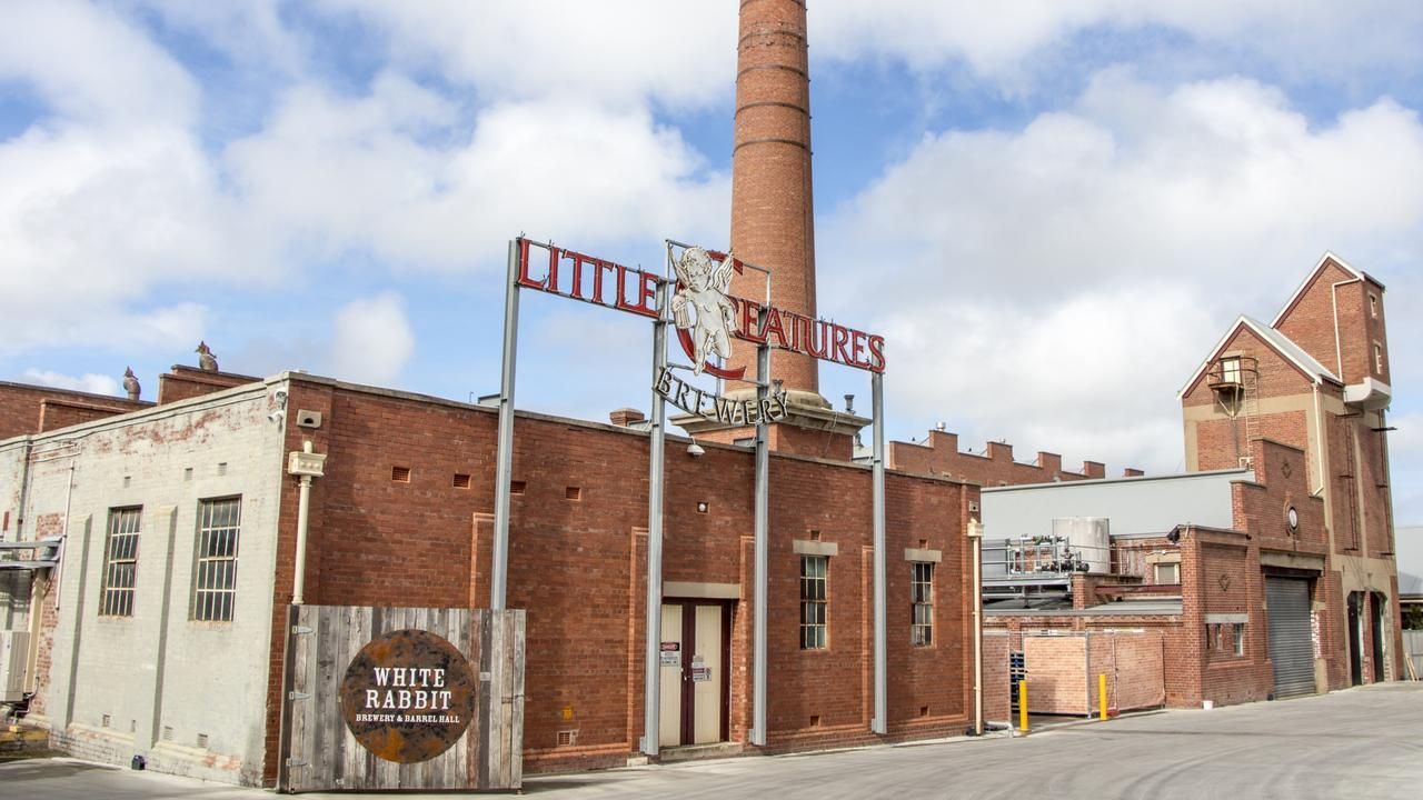 Brick building with smokestack;