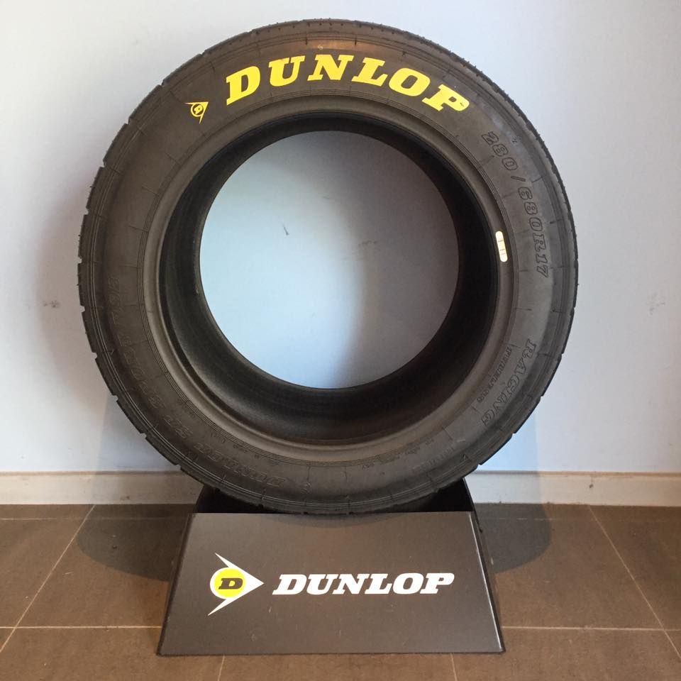 Black Dunlop Tire on a Display Stand — Warners Bay Tyre & Mechanical in Warners Bay, NSW