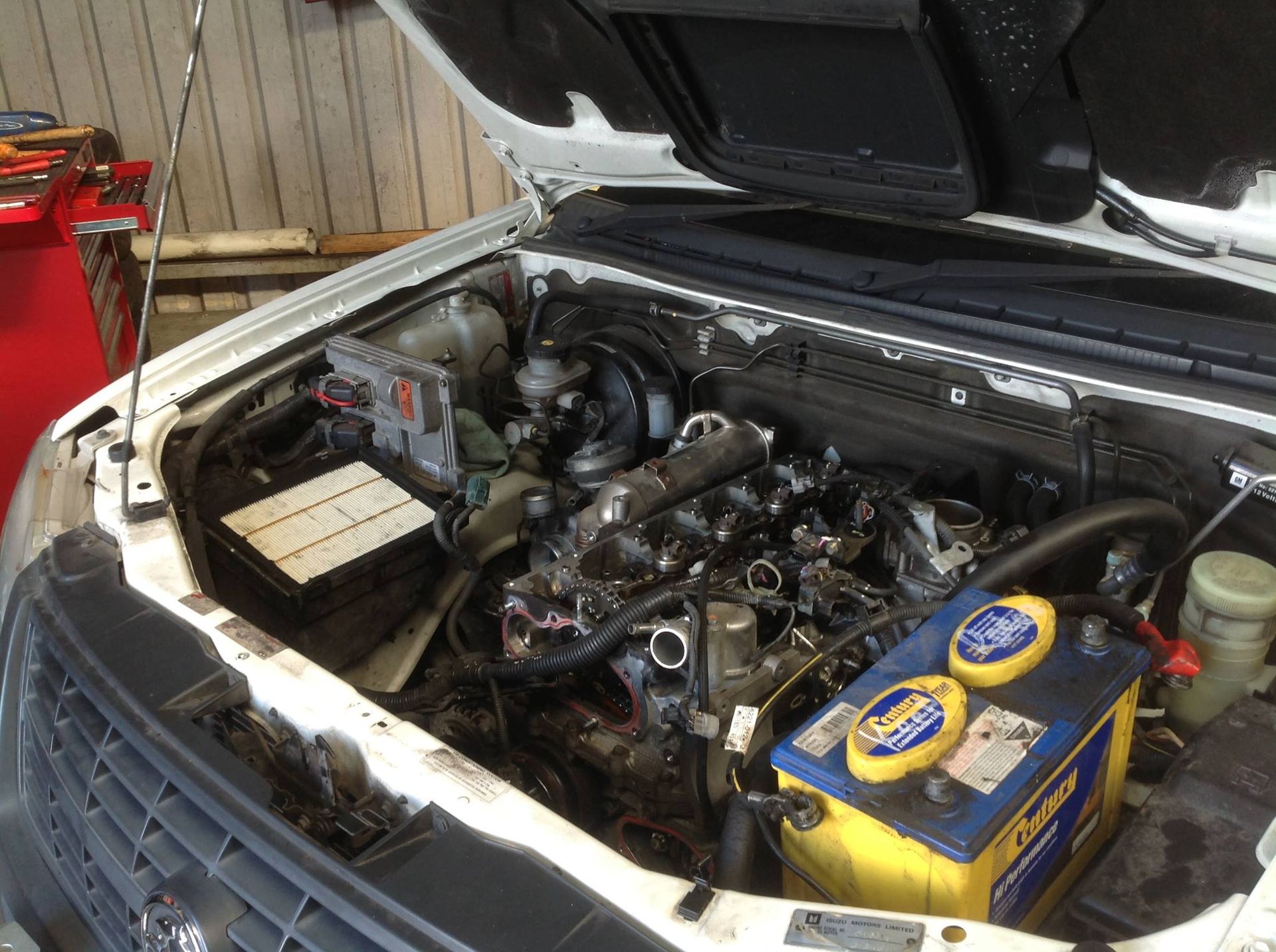 White Car Engine Bay Open — Warners Bay Tyre & Mechanical in Warners Bay, NSW
