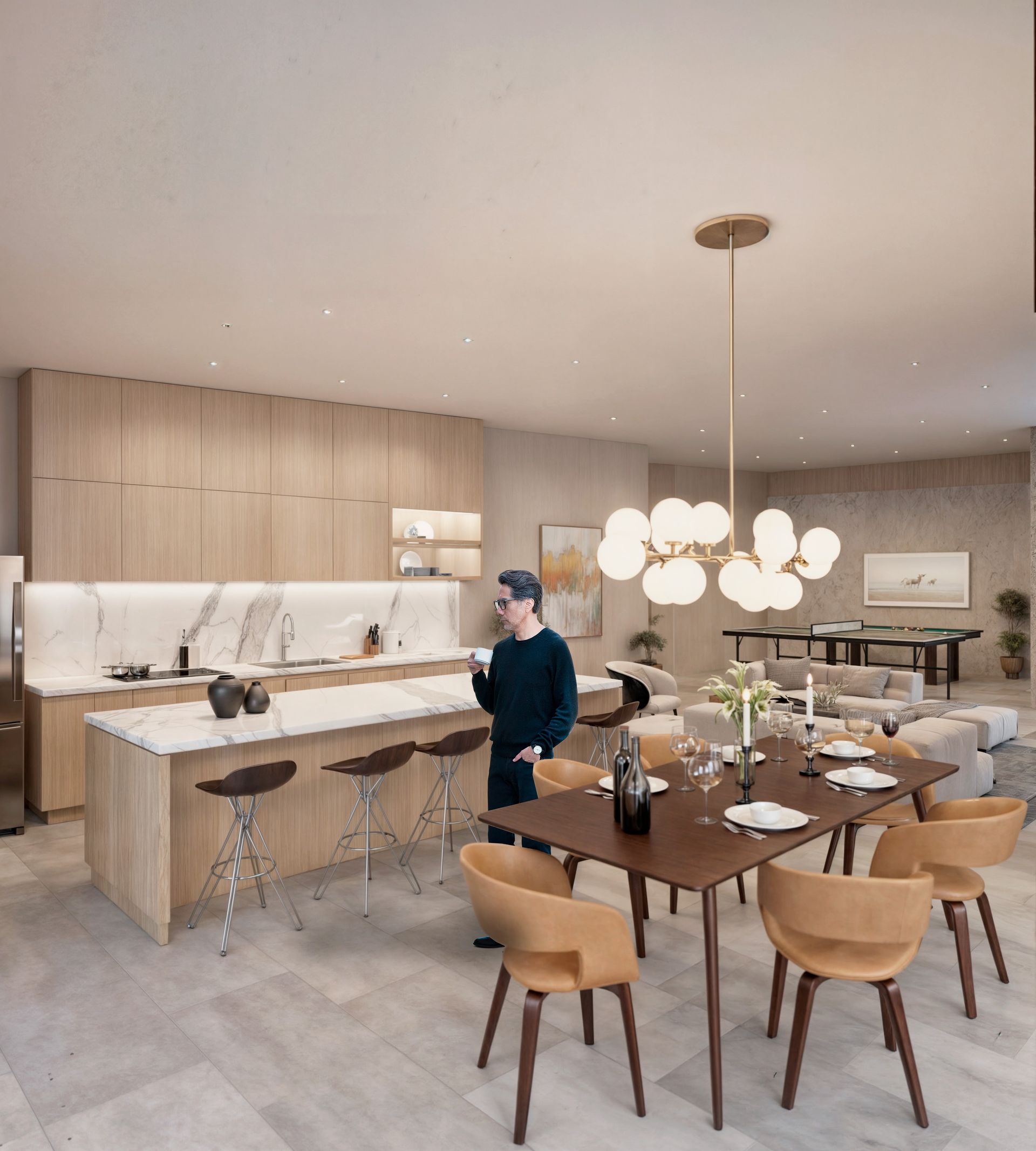 Cocina y comedor de concepto abierto con una persona de pie junto a la encimera para casas en Tijuana