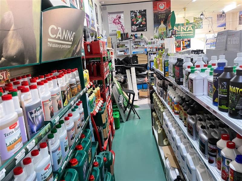 A Store Filled With Lots of Bottles of Chemicals — Cairns Hydroponics In Bungalow, QLD