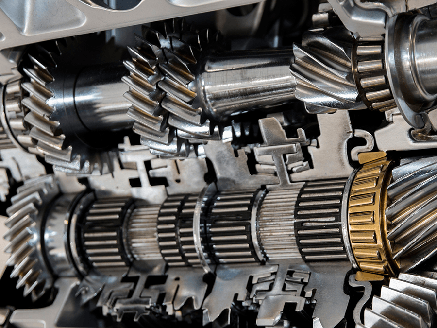 A close up of a gearbox with a lot of gears