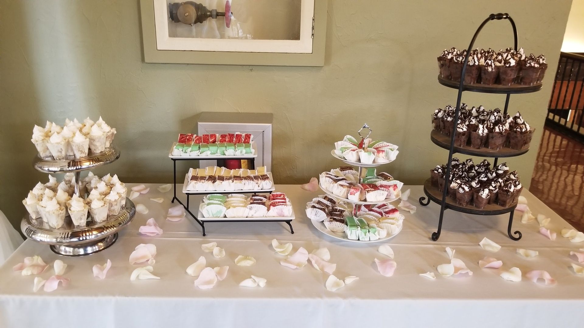 A table with a variety of desserts on it