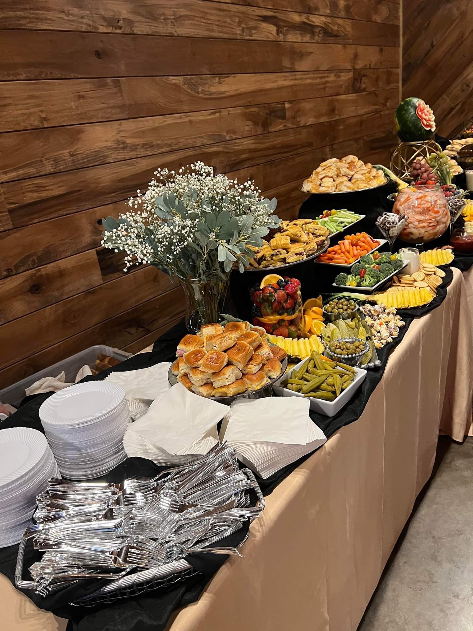 There is a buffet table with a lot of food on it.