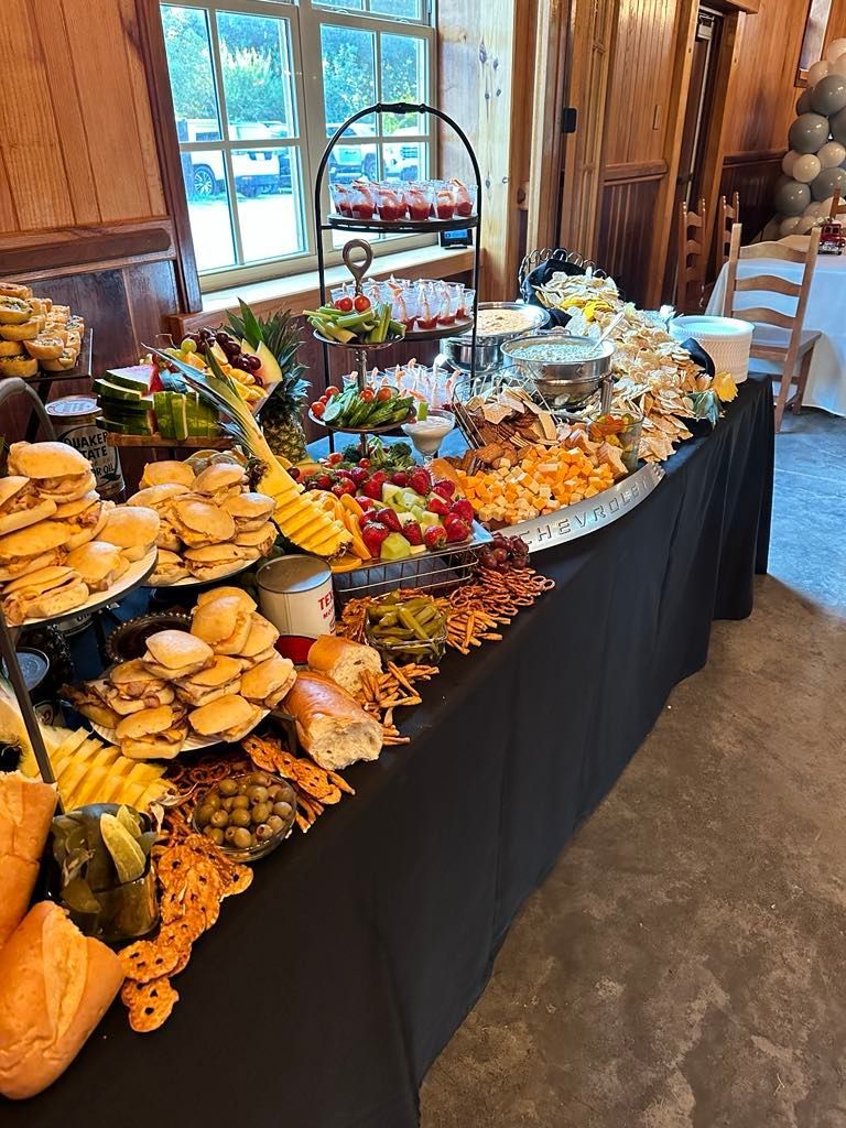 There is a buffet table with a lot of food on it.