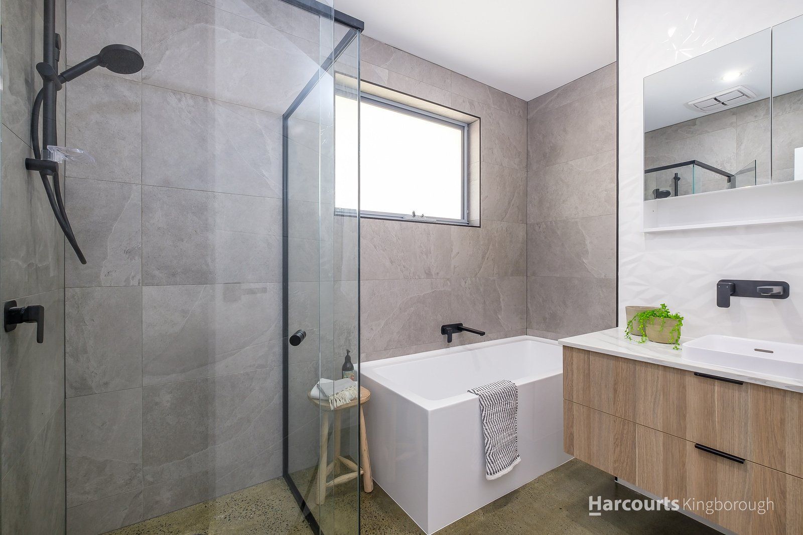 Trendy Bathroom with White Bath Tub — Moonah, TAS — Lifestyle Kitchens, Wardrobes & Showerscreens