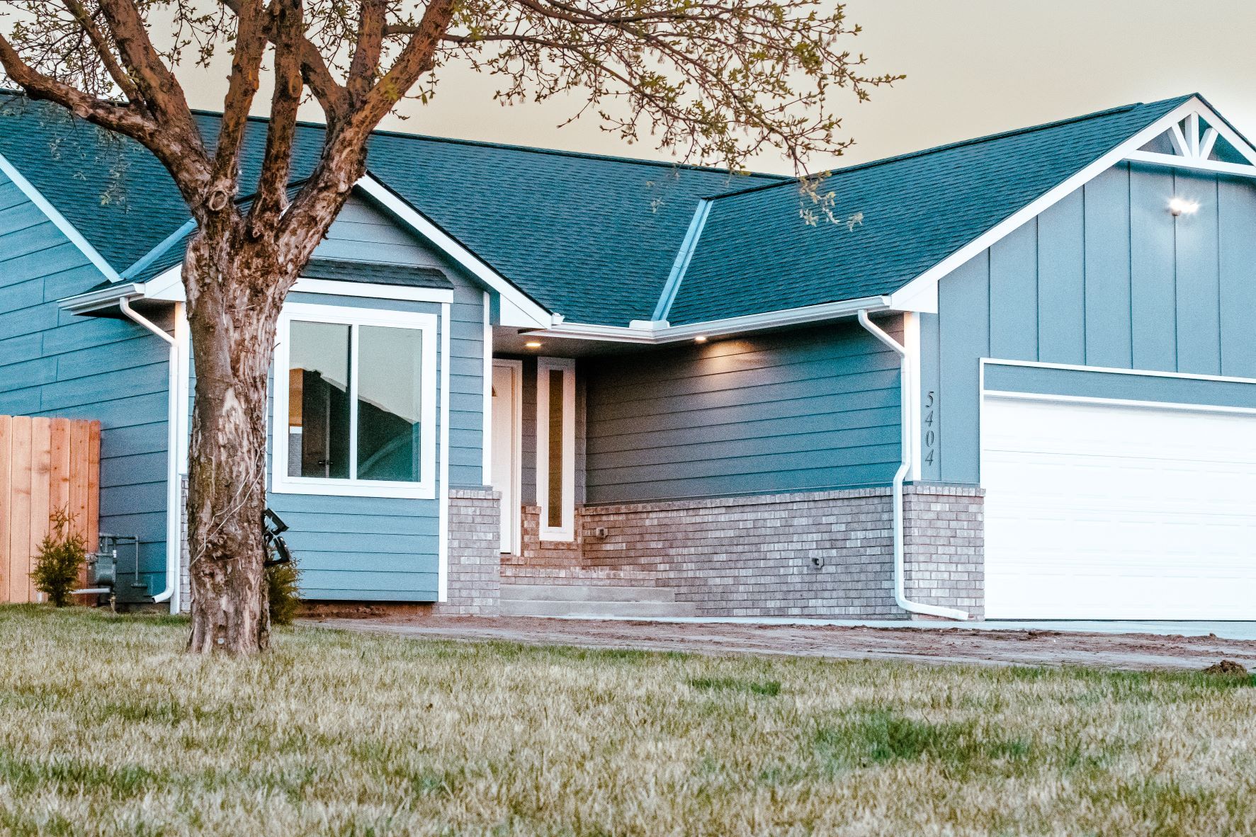 Blue Green House | Wichita, KS | Precision Wealth Building