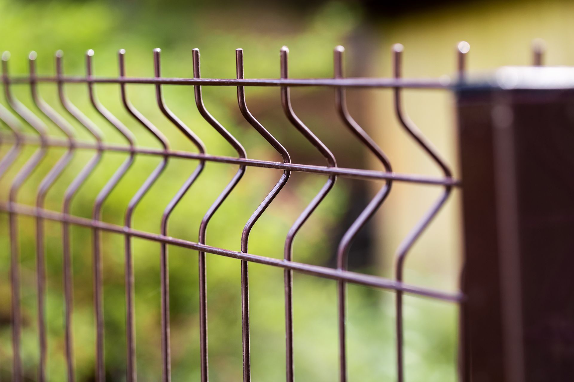 A close up of a metal fence