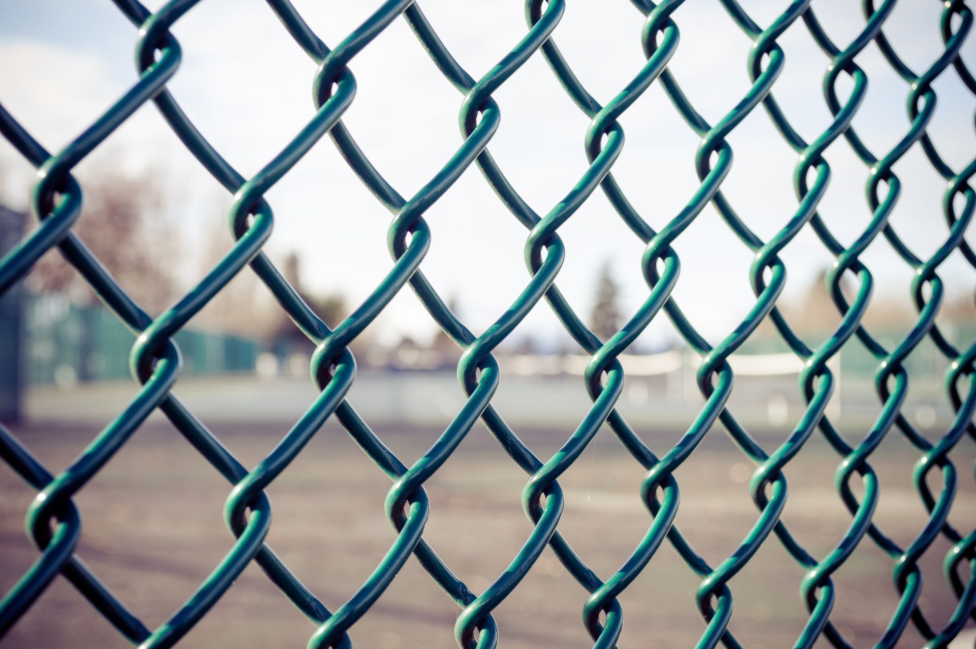 A close up of a chain link fence