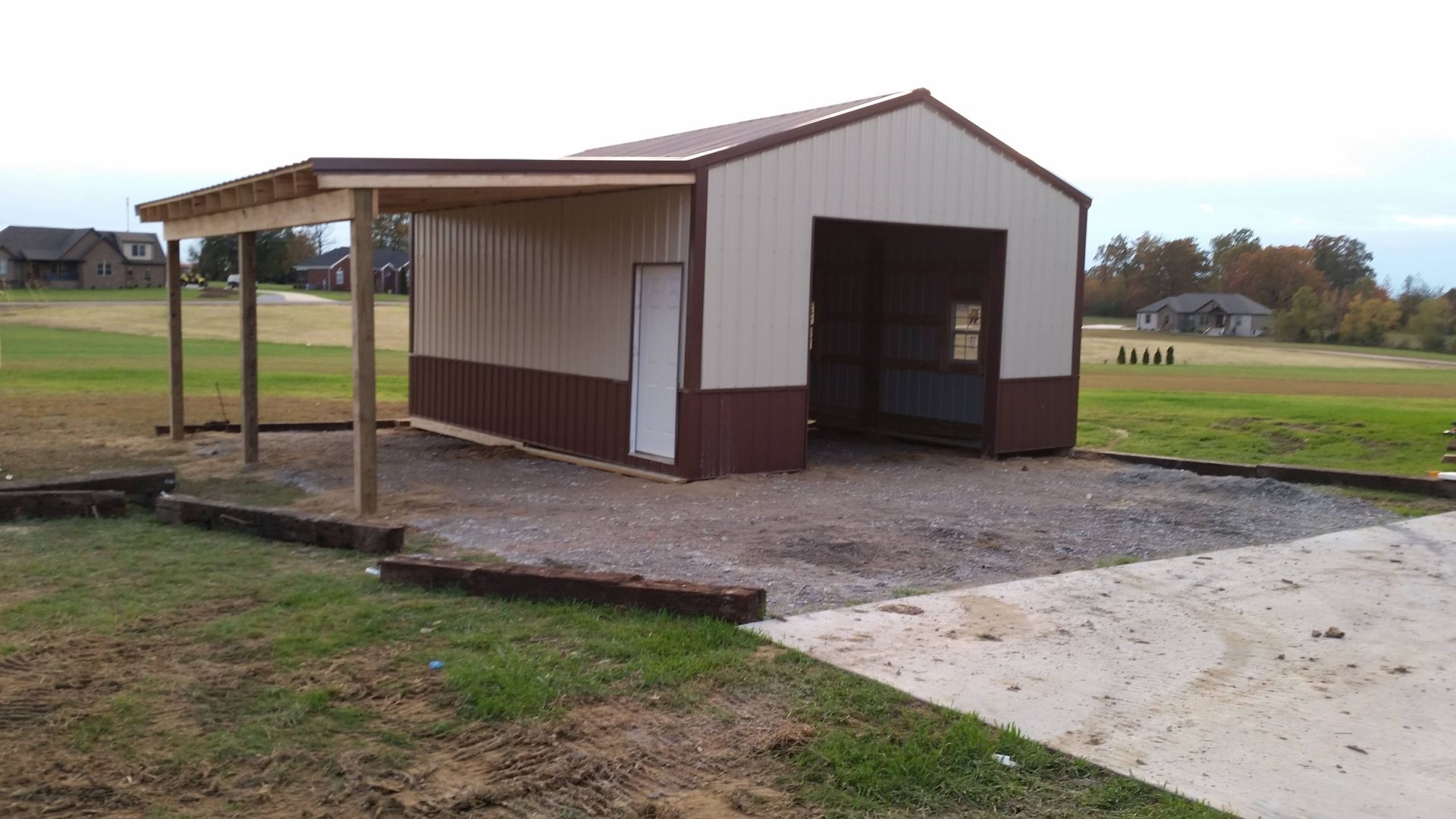 A garage with a covered area underneath it