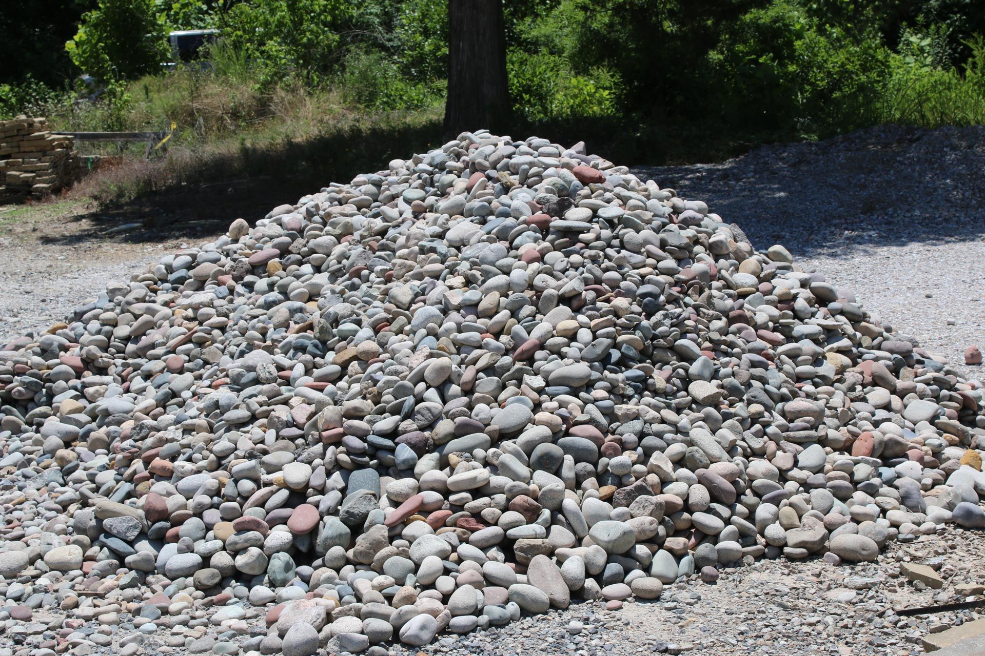 A pile of rocks sitting on top of a wooden pallet.