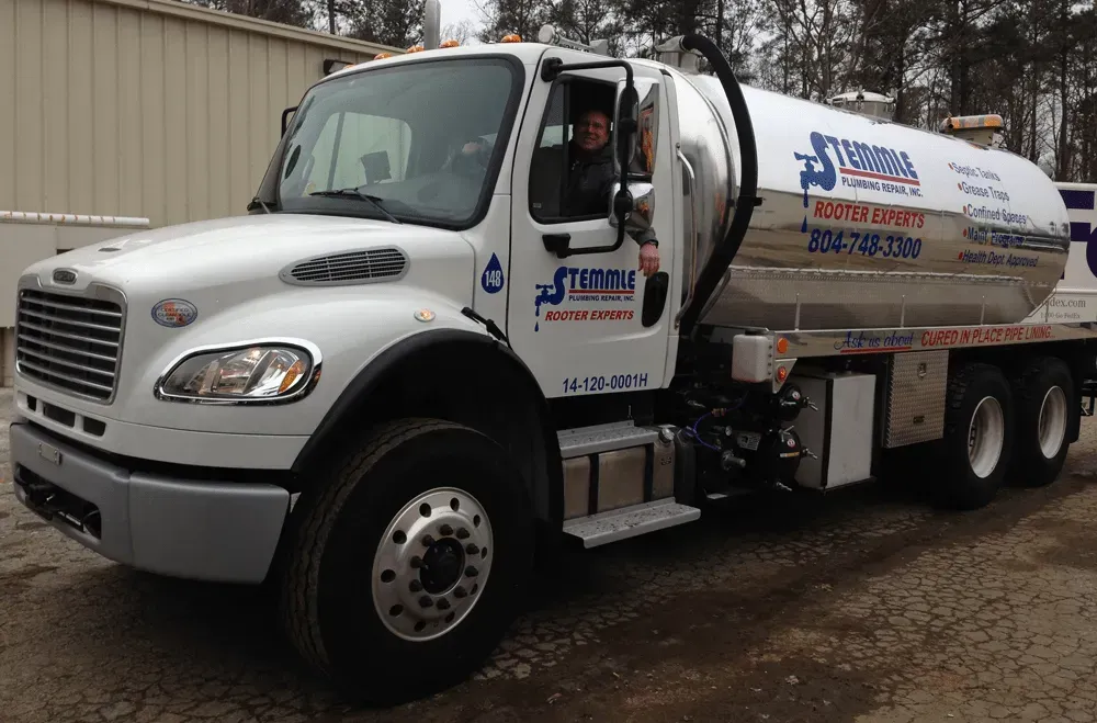 Stemmle employee in a septic truck