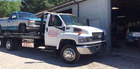 midway garage and wrecker service towing truck
